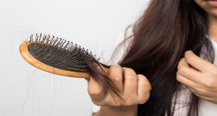 علت ریزش مو در زنان کمبود چه ویتامینی است